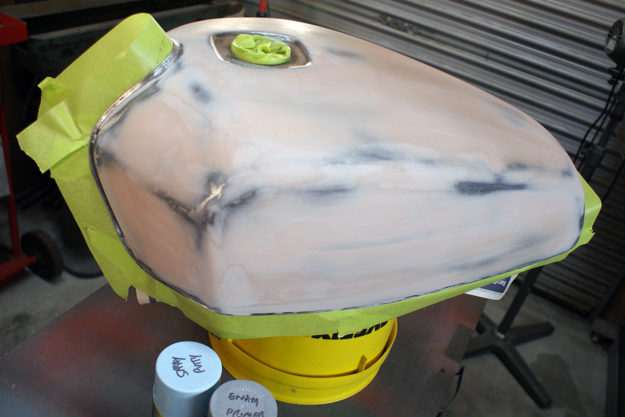 Masking a motorcycle tank for paint