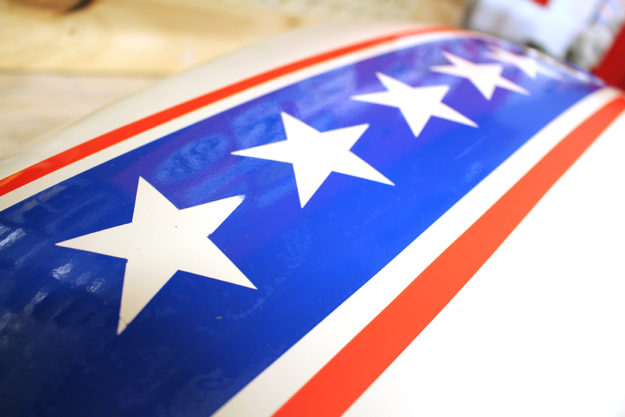 Painting a motorcycle tank with Stars and Stripes