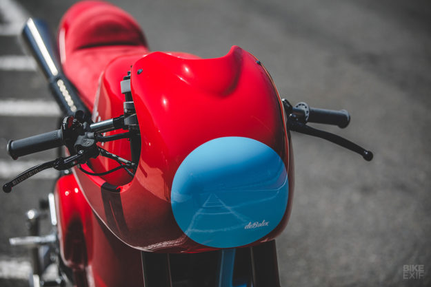 Red Hot: DeBolex deliberately left off a headlight, tail light or turn signals, to maximize the race vibe of the bike. But it is 'daytime' street legal in the UK, so hopefully it'll get out regularly. A custom Ducati Scrambler from deBolex Engineering