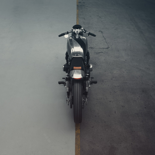A dark, low-slung Honda CB750 customized by Hookie Co of Germany.