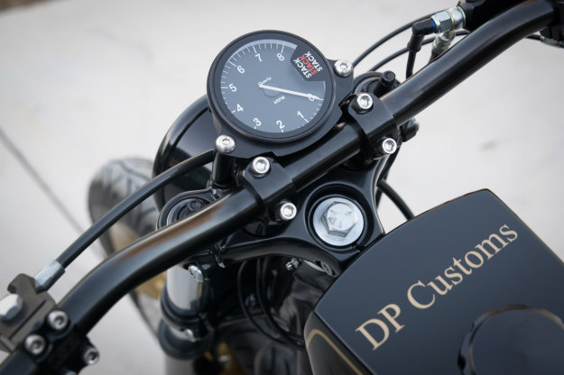 The Player: DP Customs' radical 1200 Sportster looks magnificent in the classic JPS racing livery.