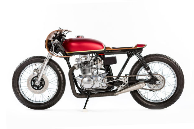 This Honda CB350 motorcycle has been beautifully customized with wood bodywork