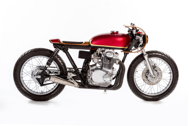 This Honda CB350 motorcycle has been beautifully customized with wood bodywork