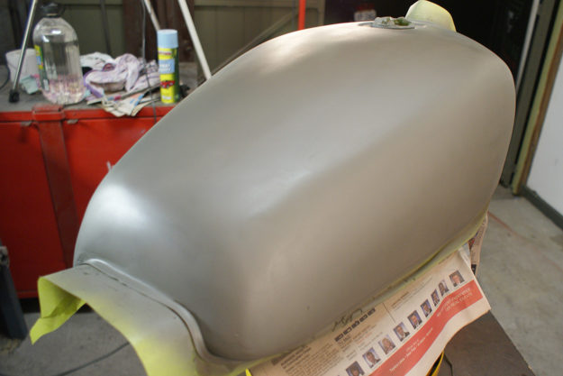 Painting a motorcycle tank with primer