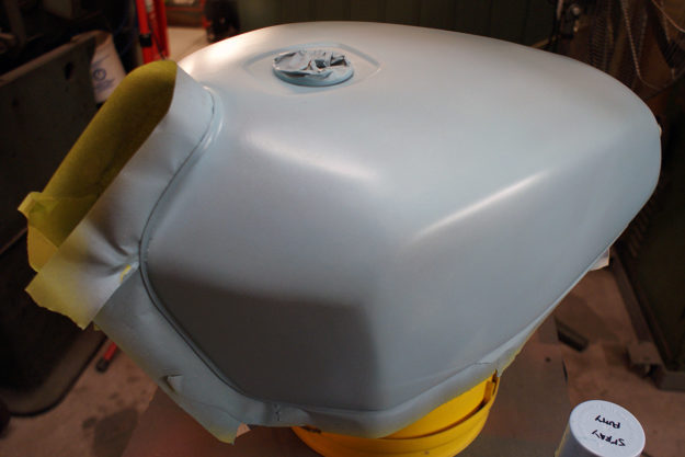 Spray putty on a motorcycle tank
