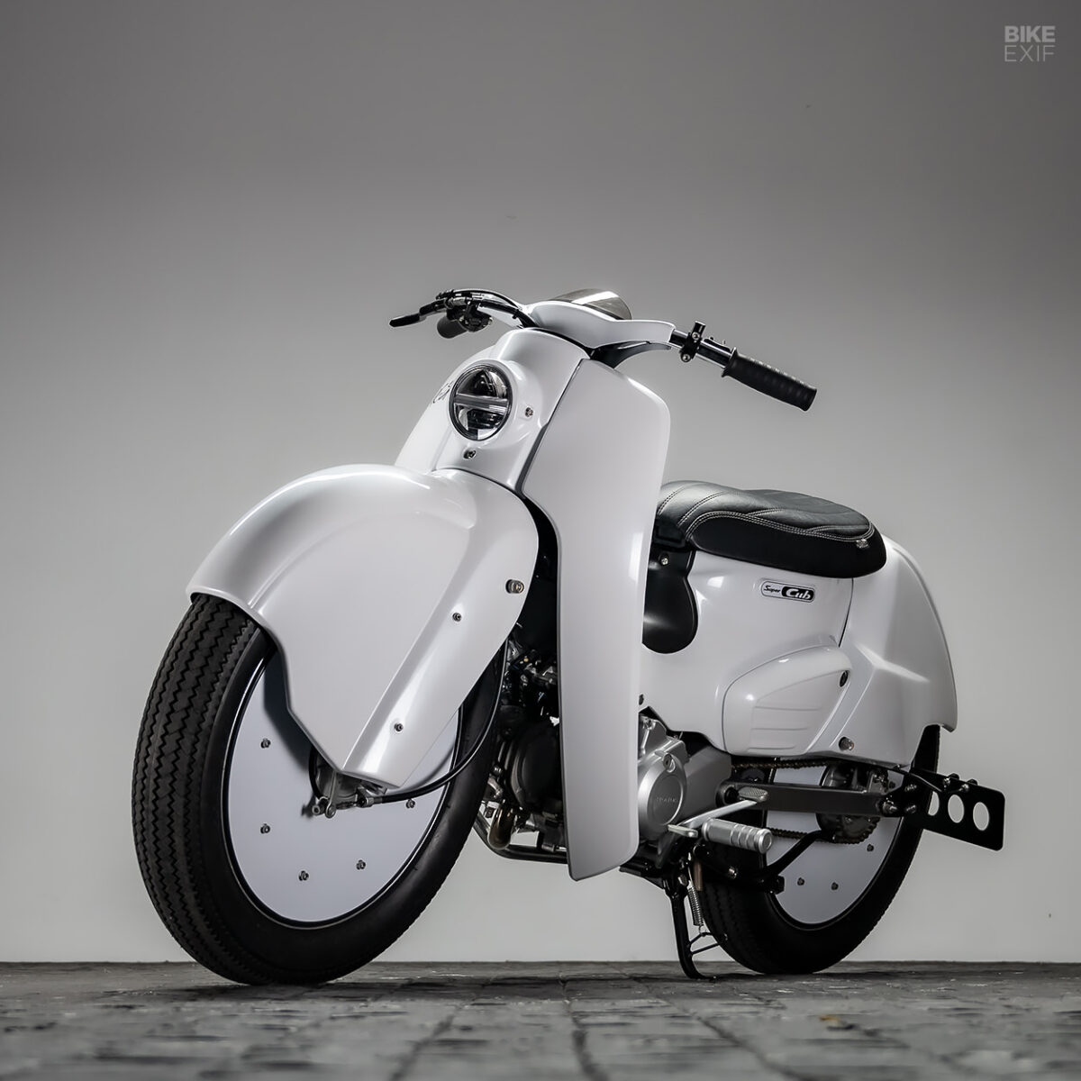 Black and white: Two Honda Super Cub customs by K-Speed | Bike EXIF